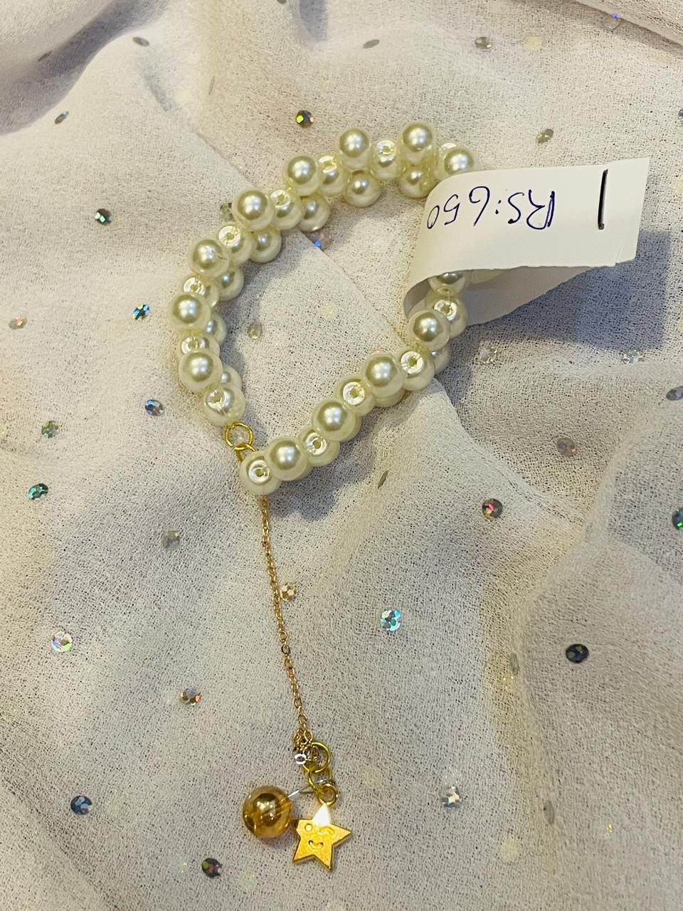 Pearl criss cross bracelet