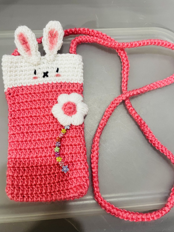 Mobile pouch with strap