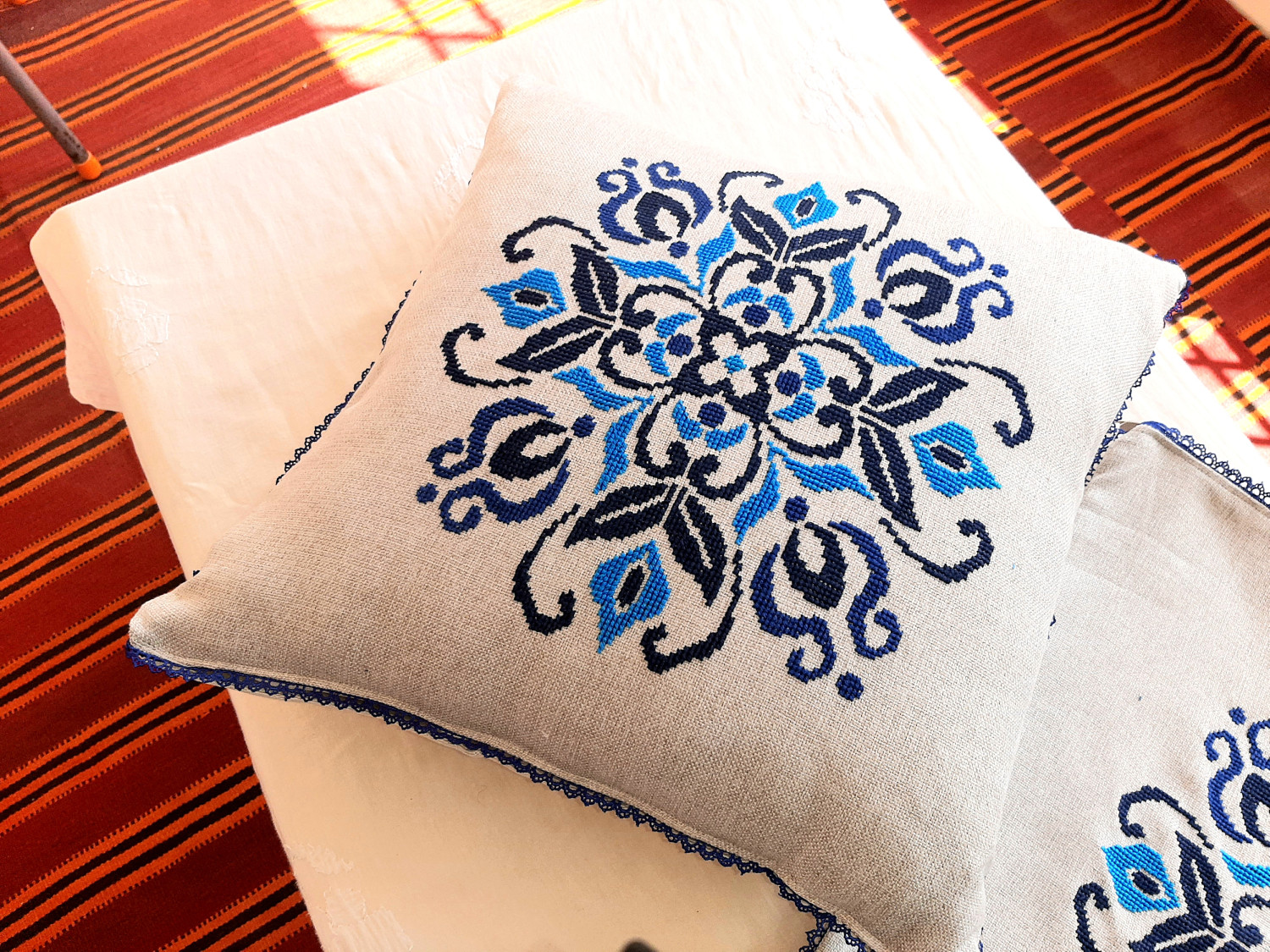 2 Pcs cushion covers-Royal Rotation - Hand Embroidered Blue Wheel Pattern on Silver Jute Luxury Cushion